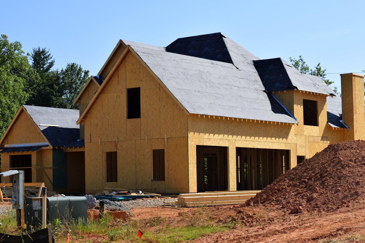 Brown and Gray Wooden 2-storey House Near Tree